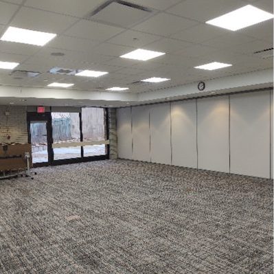 Austin Lake Meeting Room without chairs and tables set up.