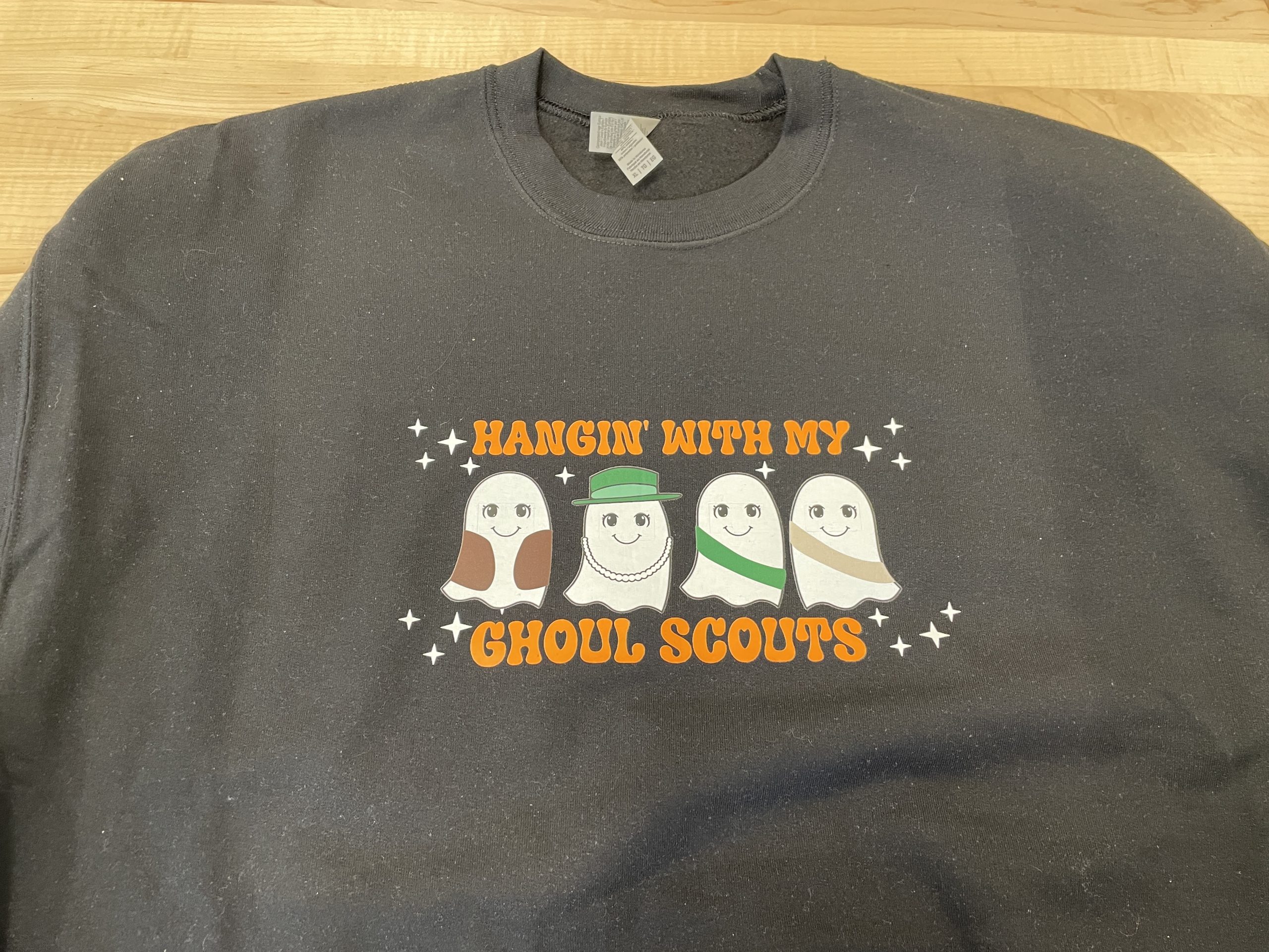 T-shirt with graphic of four ghosts including text: Hangin' with my Ghoul Scouts.